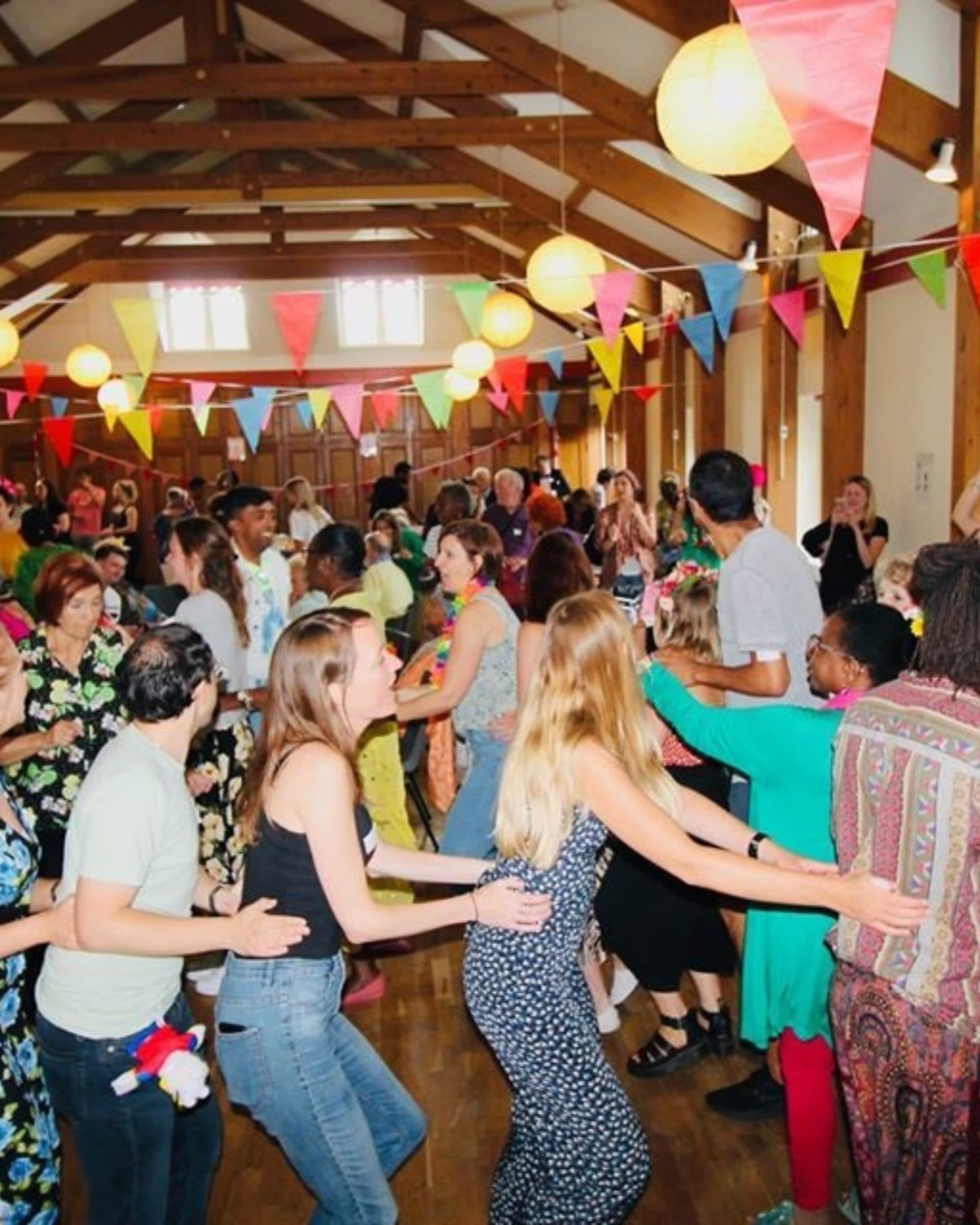 people doing the conga at a party